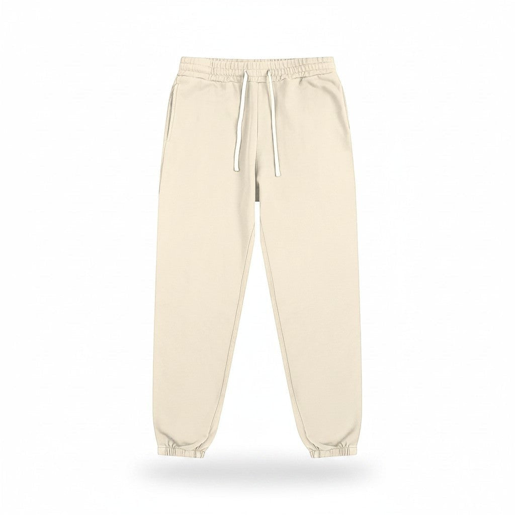 VaultWear unisex beige cotton sweatpants with a drawstring waist and cuffed ankles for a casual, comfortable fit.